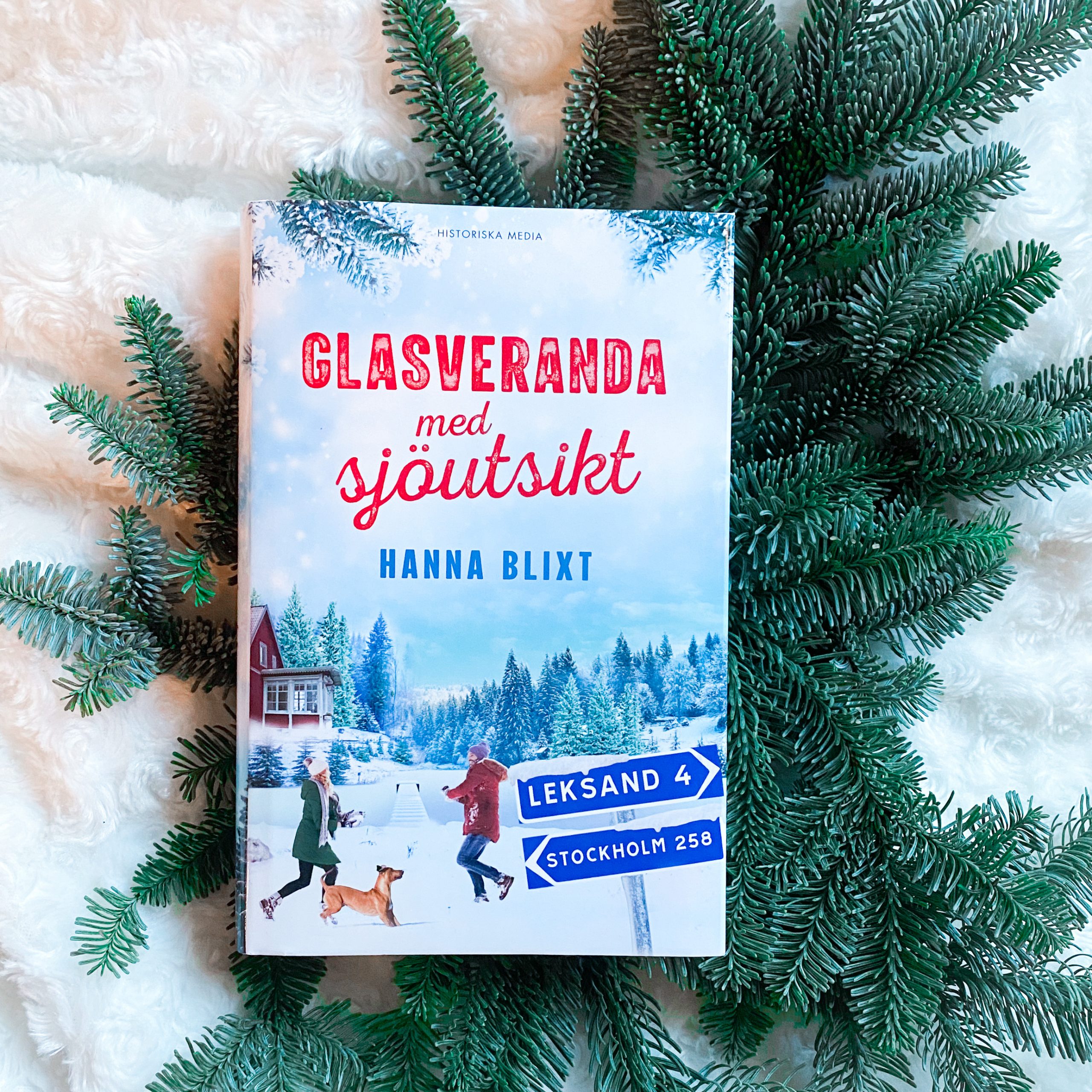 glasveranda med sjöutsikt omslag